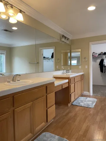 a bath tub sitting next to a shower