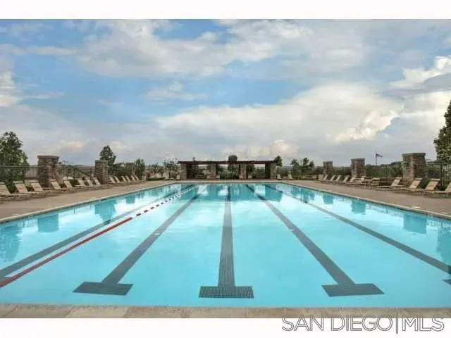 a view of lake with green space