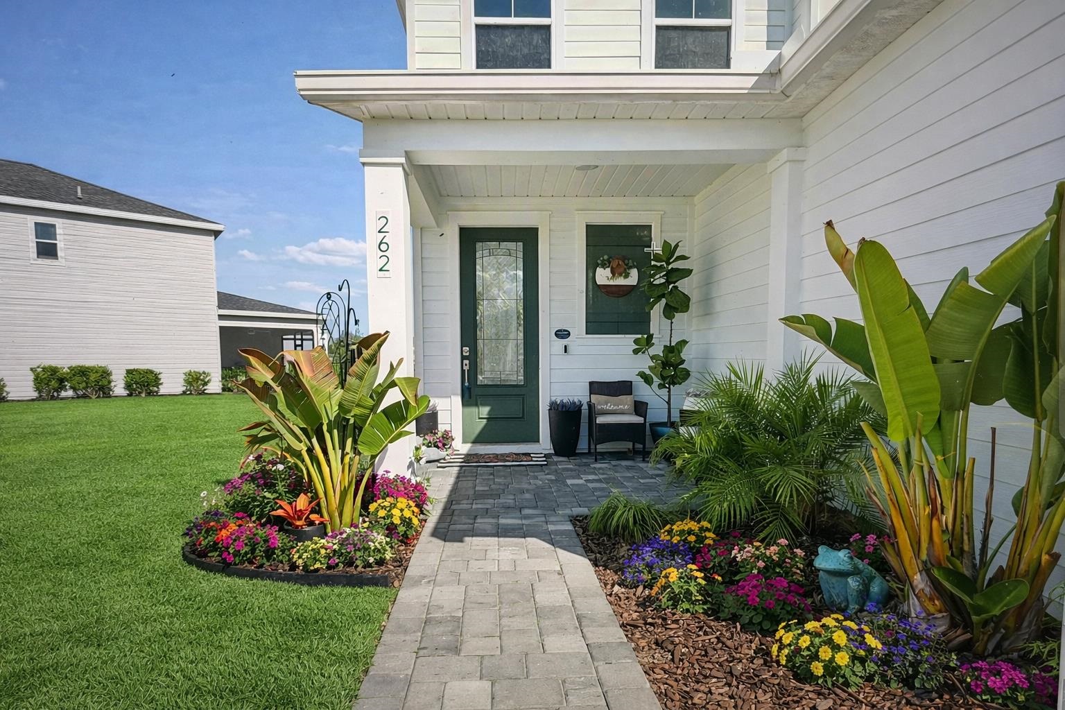 262 Killarney Avenue St. Johns, FL 32259 - Photo 3 of 100 Property entrance with a porch and a yard
