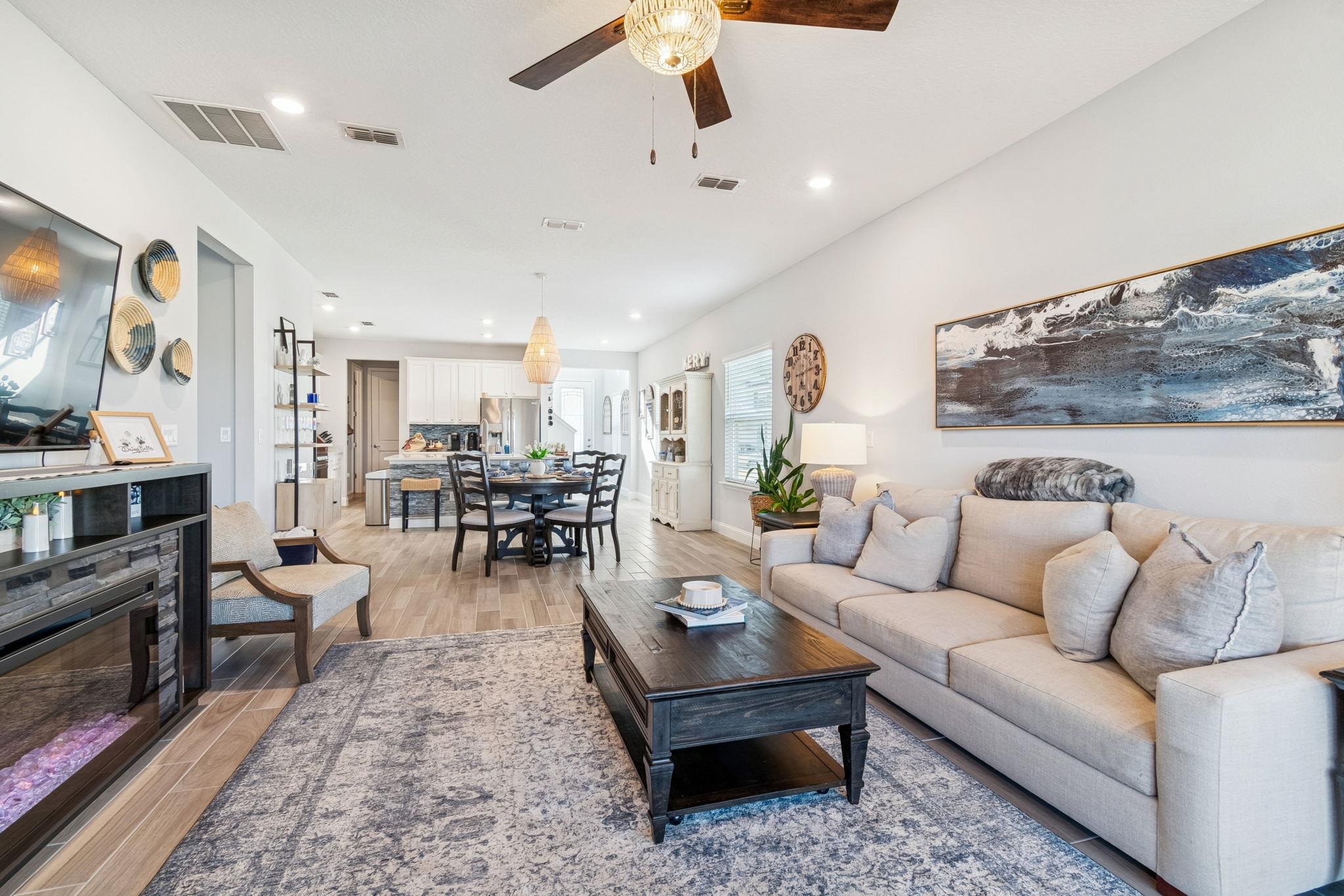 262 Killarney Avenue St. Johns, FL 32259 - Photo 29 of 100 Living area with wood finish floors, ceiling fan, recessed lighting, and a glass covered fireplace
