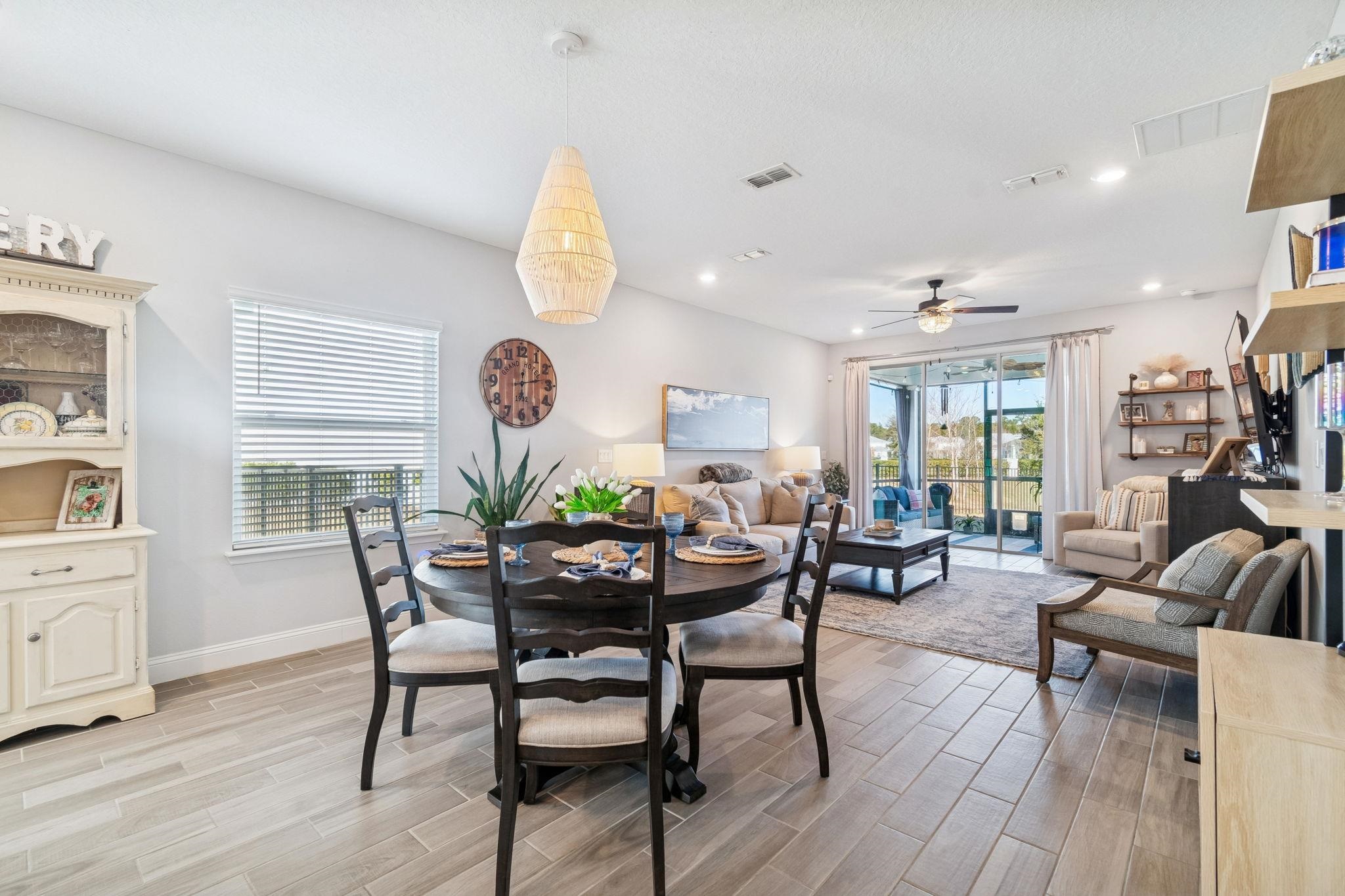 262 Killarney Avenue St. Johns, FL 32259 - Photo 30 of 100 Dining space with wood tiled floors, a ceiling fan, and recessed lighting