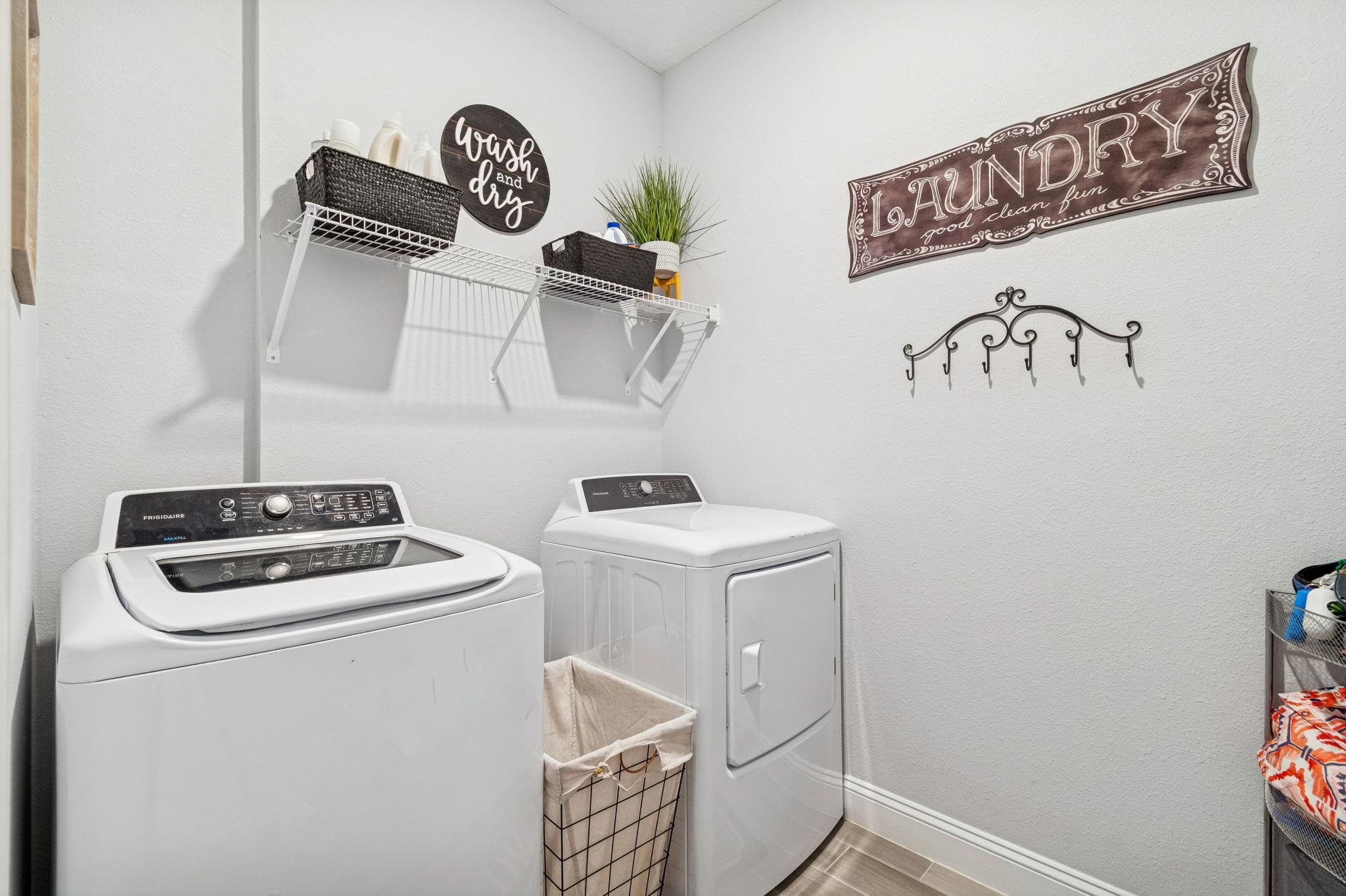 262 Killarney Avenue St. Johns, FL 32259 - Photo 32 of 100 Laundry area featuring baseboards and washer and dryer