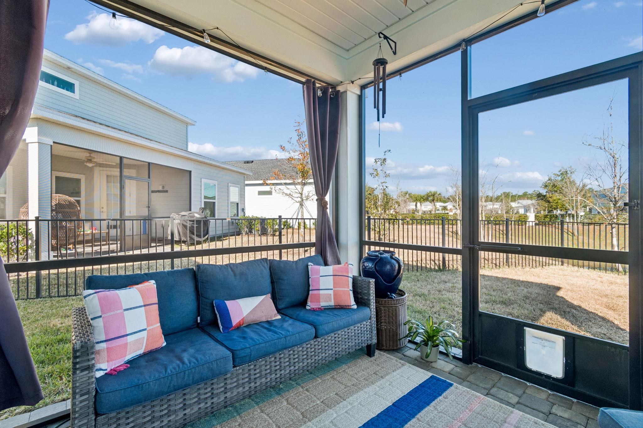 262 Killarney Avenue St. Johns, FL 32259 - Photo 64 of 100 Sunroom with an outdoor hangout area, a residential view, and plenty of natural light