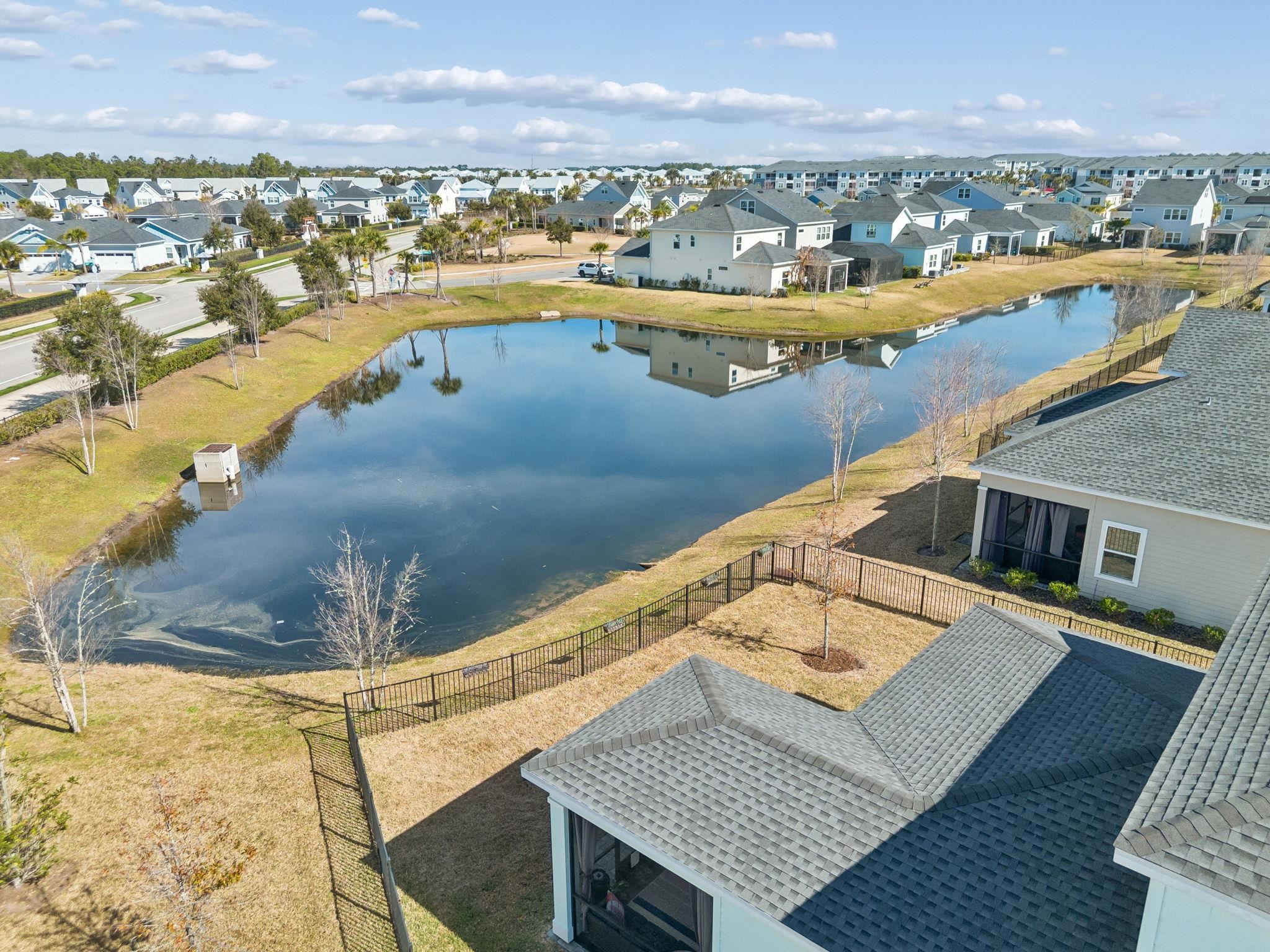 262 Killarney Avenue St. Johns, FL 32259 - Photo 72 of 100 Aerial perspective of suburban area with a large body of water