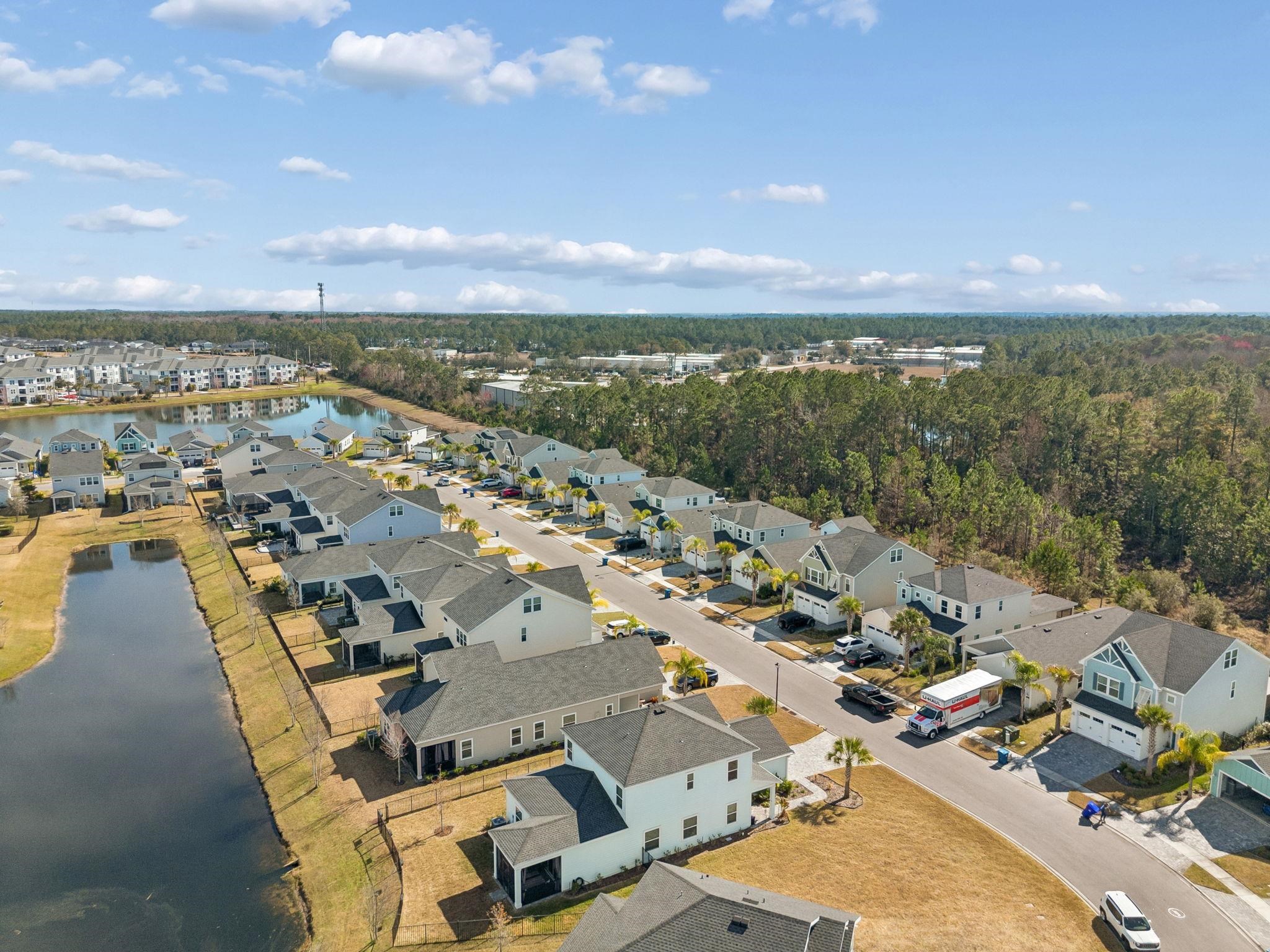 262 Killarney Avenue St. Johns, FL 32259 - Photo 79 of 100 Aerial perspective of suburban area featuring a nearby body of water
