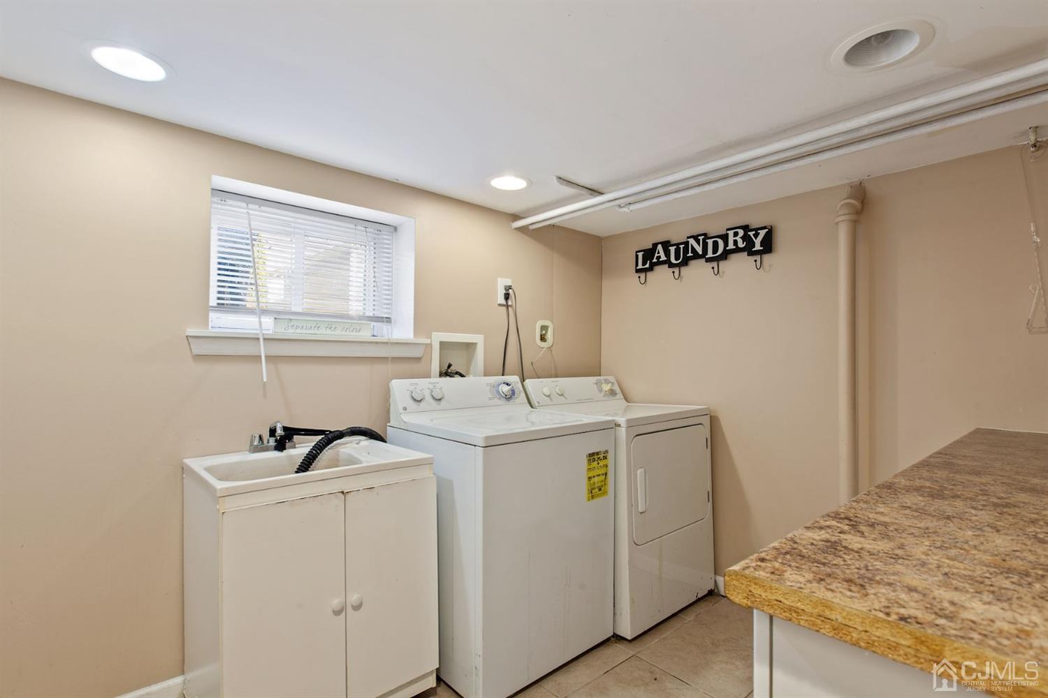 310 Salem Road Union, NJ 07083 - Photo 22 of 27 a utility room with dryer and washer