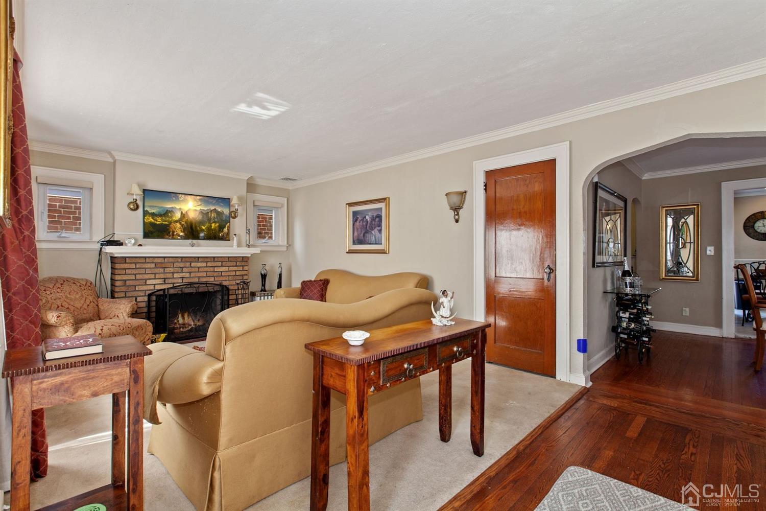 310 Salem Road Union, NJ 07083 - Photo 8 of 27 a living room with furniture and a fireplace