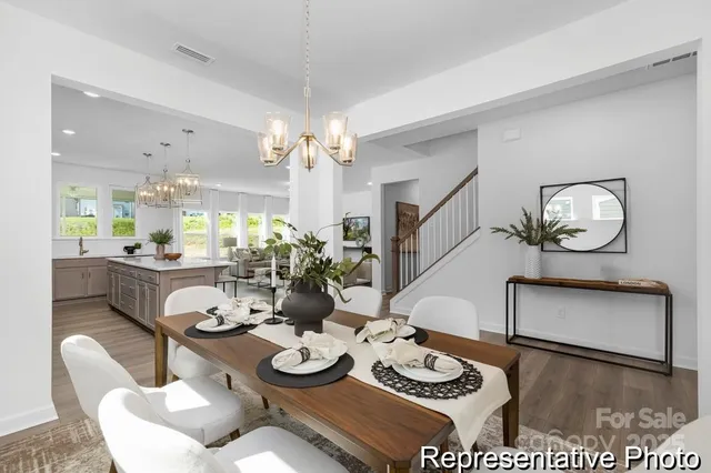 a view of a dining room and furniture