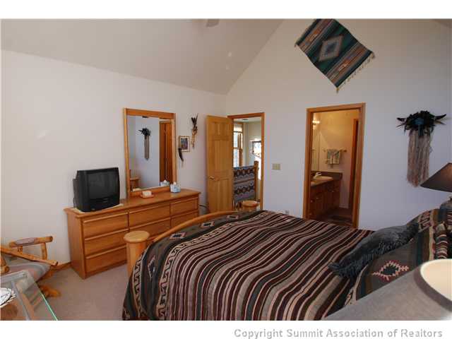 42 Snake River Road, Unit 45 Dillon, CO 80435 - Photo 7 of 16 Master Bedroom.