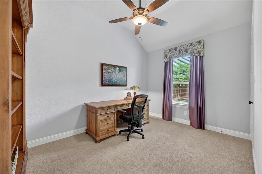 6656 Roughleaf Ridge Road Flower Mound, TX 76226 - Photo 22 of 40 a view of a workspace with furniture and a window