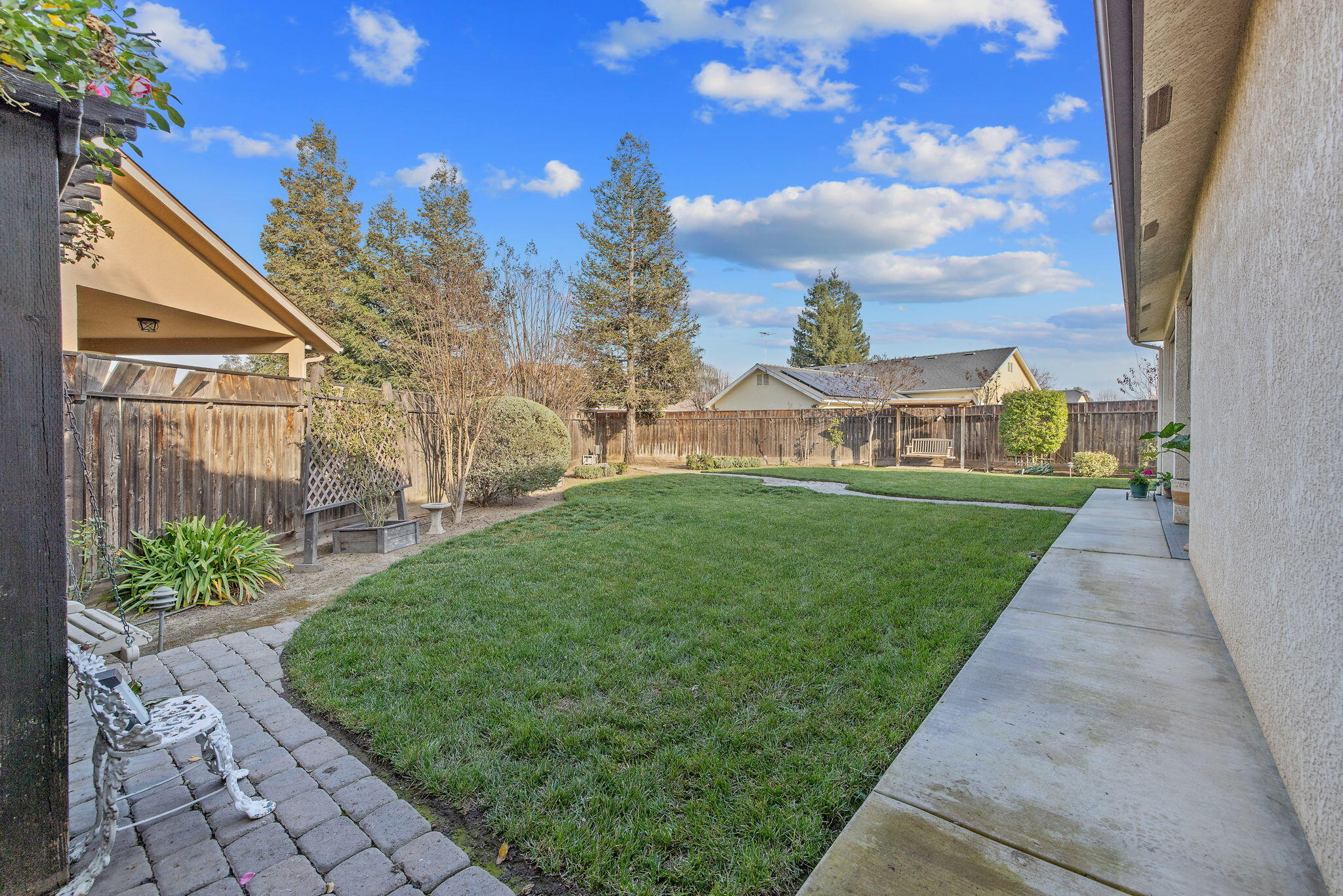729 St Thomas Court Exeter, CA 93221 - Photo 48 of 66 a view of a house with a yard