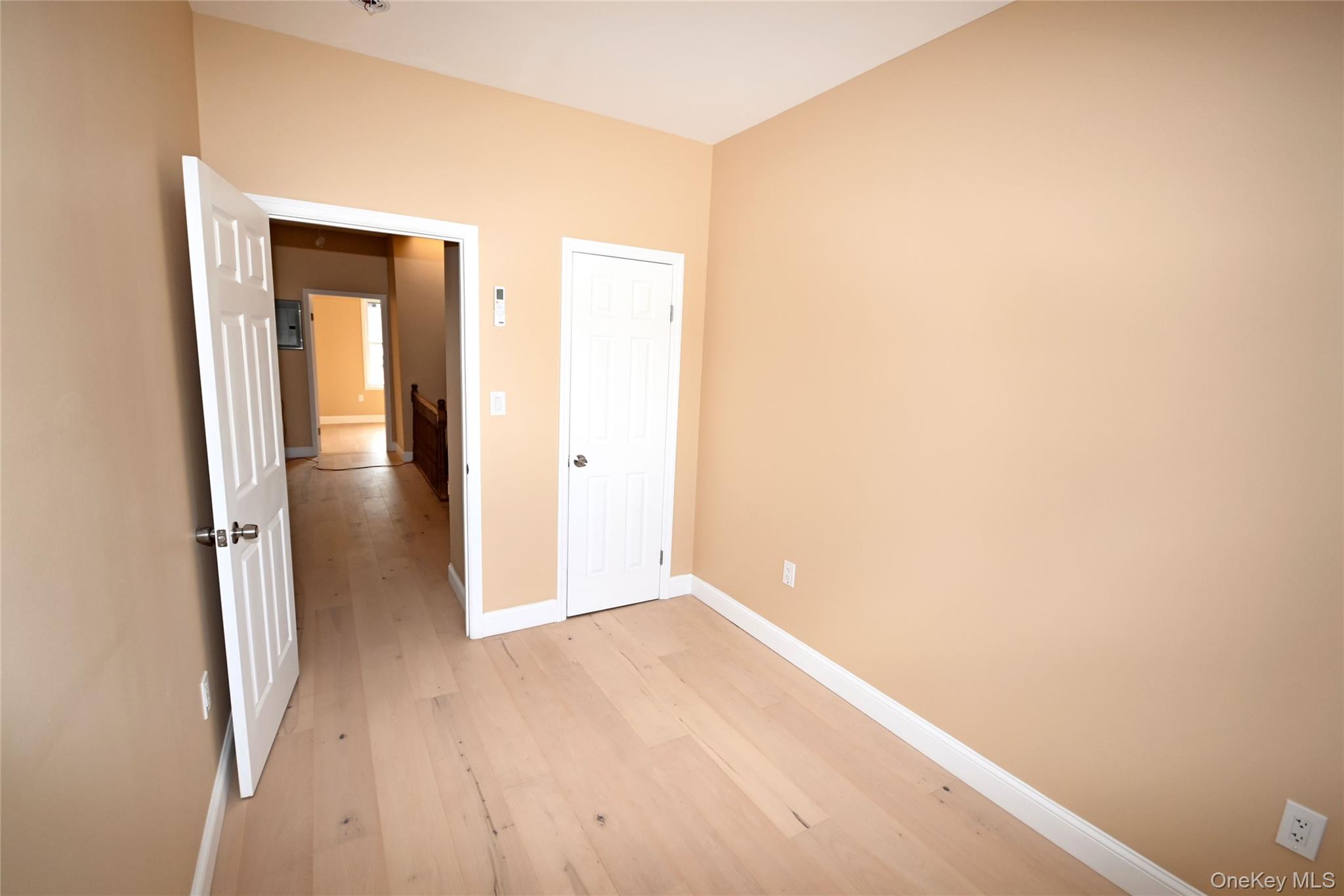 1737 Pacific Street Brooklyn, NY 11213 - Photo 17 of 38 a view of hallway with wooden floor