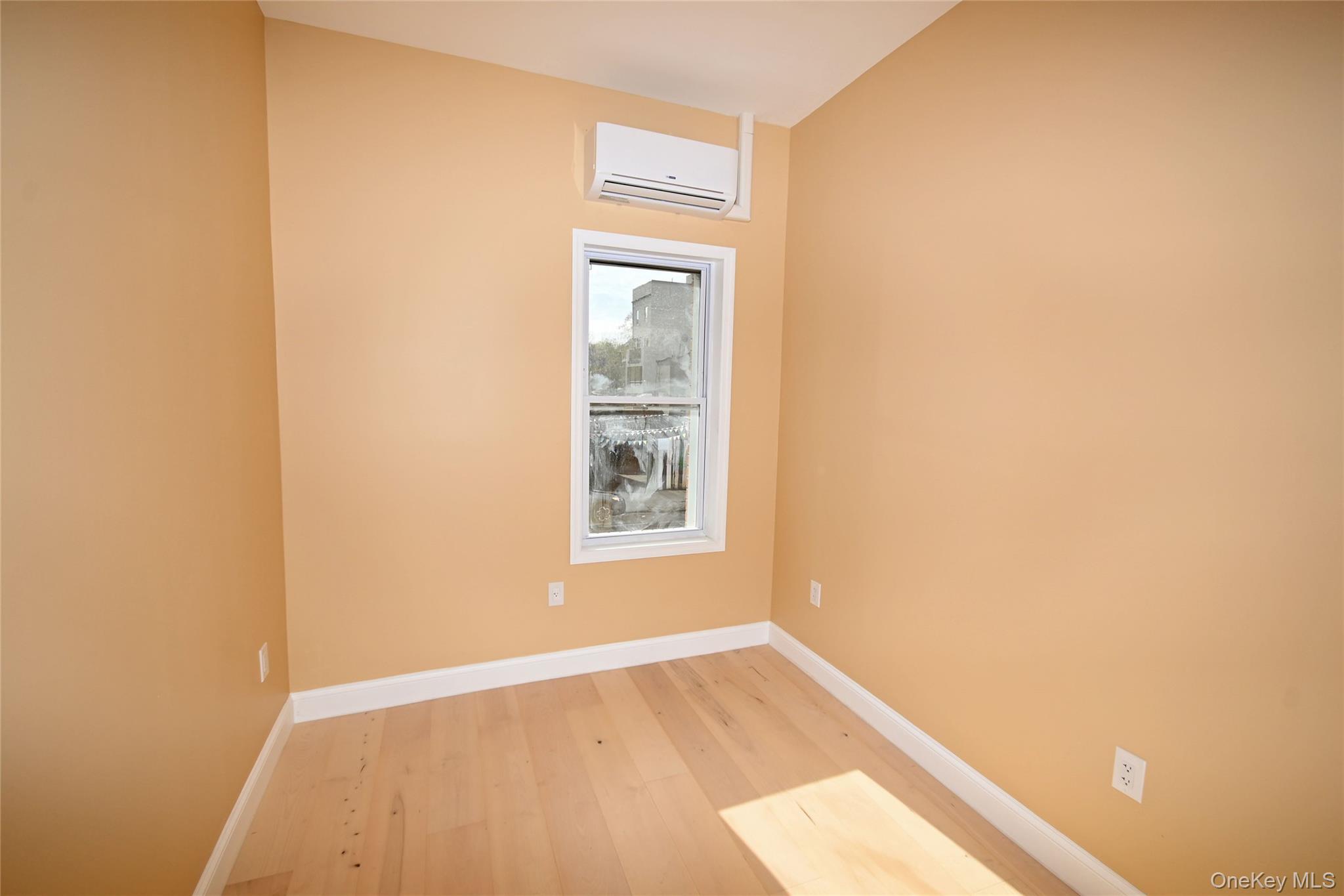 1737 Pacific Street Brooklyn, NY 11213 - Photo 19 of 38 a view of an empty room and window