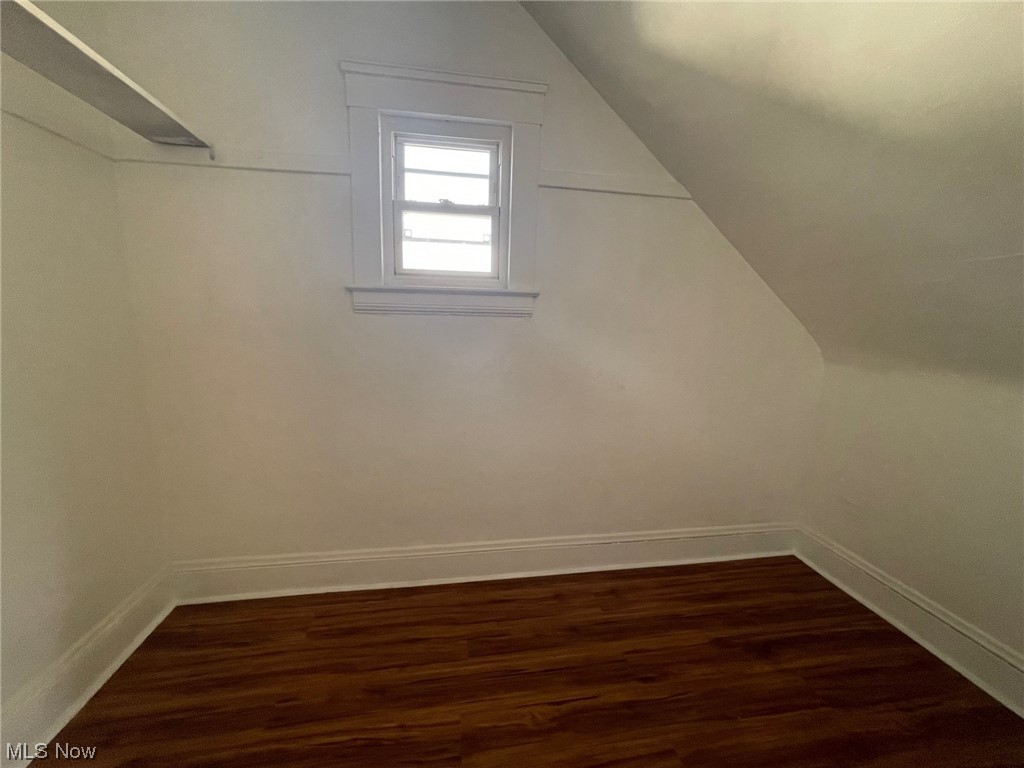 924 Richmond Road Cleveland, OH 44124 - Photo 22 of 34 Additional living space with lofted ceiling and dark wood-type flooring