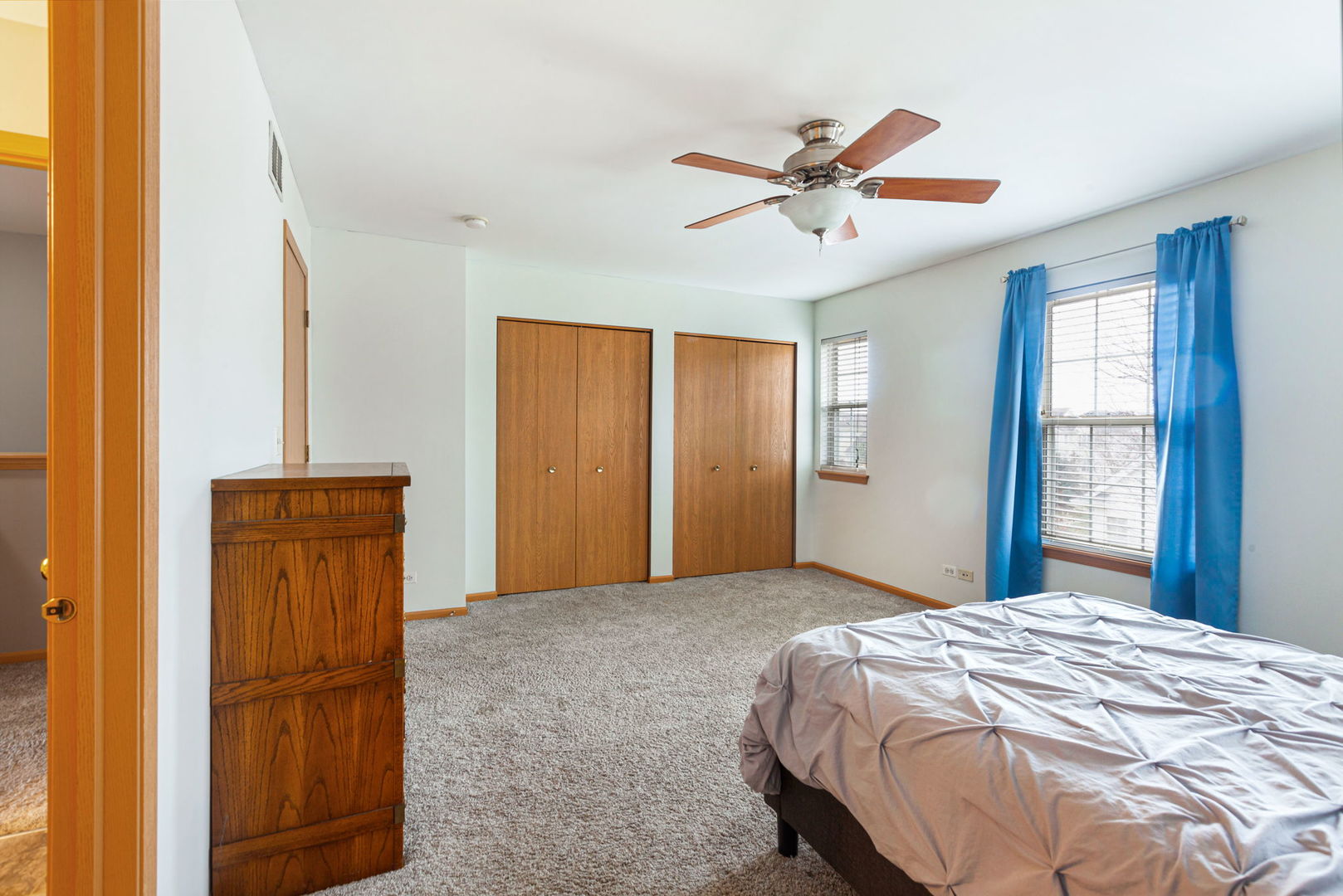 932 Clover Lane Pingree Grove, IL 60140 - Photo 12 of 19 a bedroom with a bed and a window