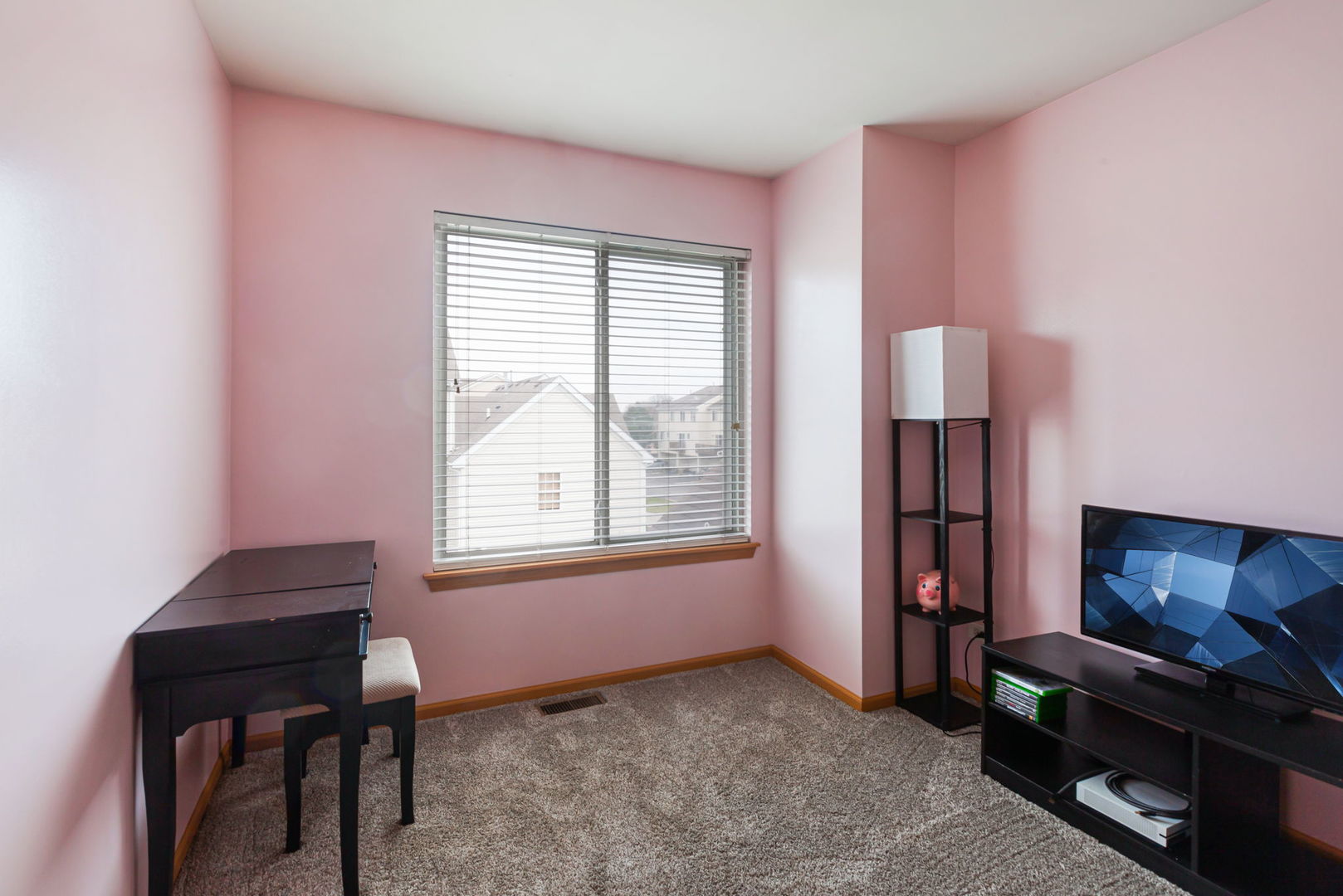 932 Clover Lane Pingree Grove, IL 60140 - Photo 14 of 19 a view of a livingroom with furniture and a window