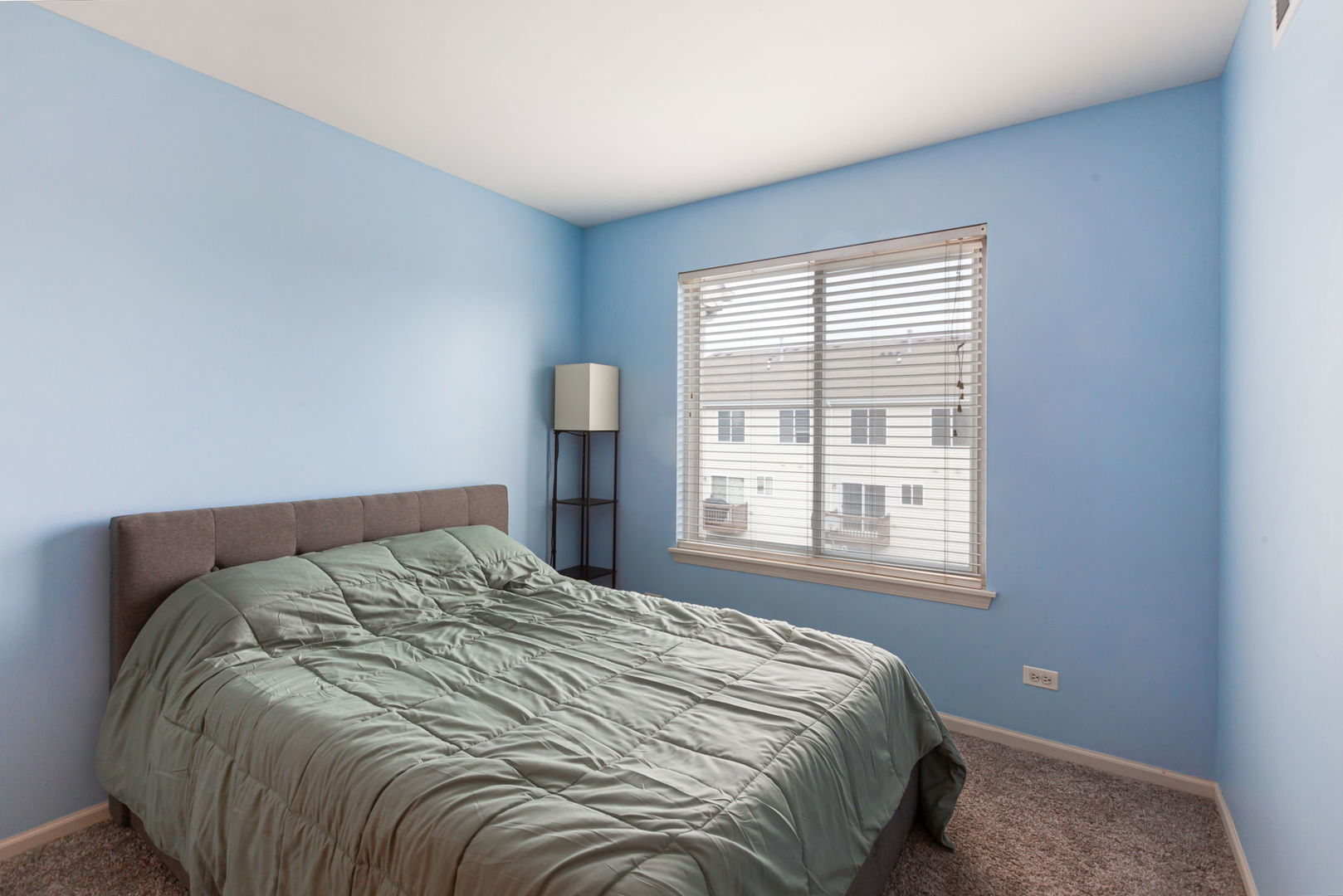 932 Clover Lane Pingree Grove, IL 60140 - Photo 15 of 19 a bed sitting in a bedroom next to a window