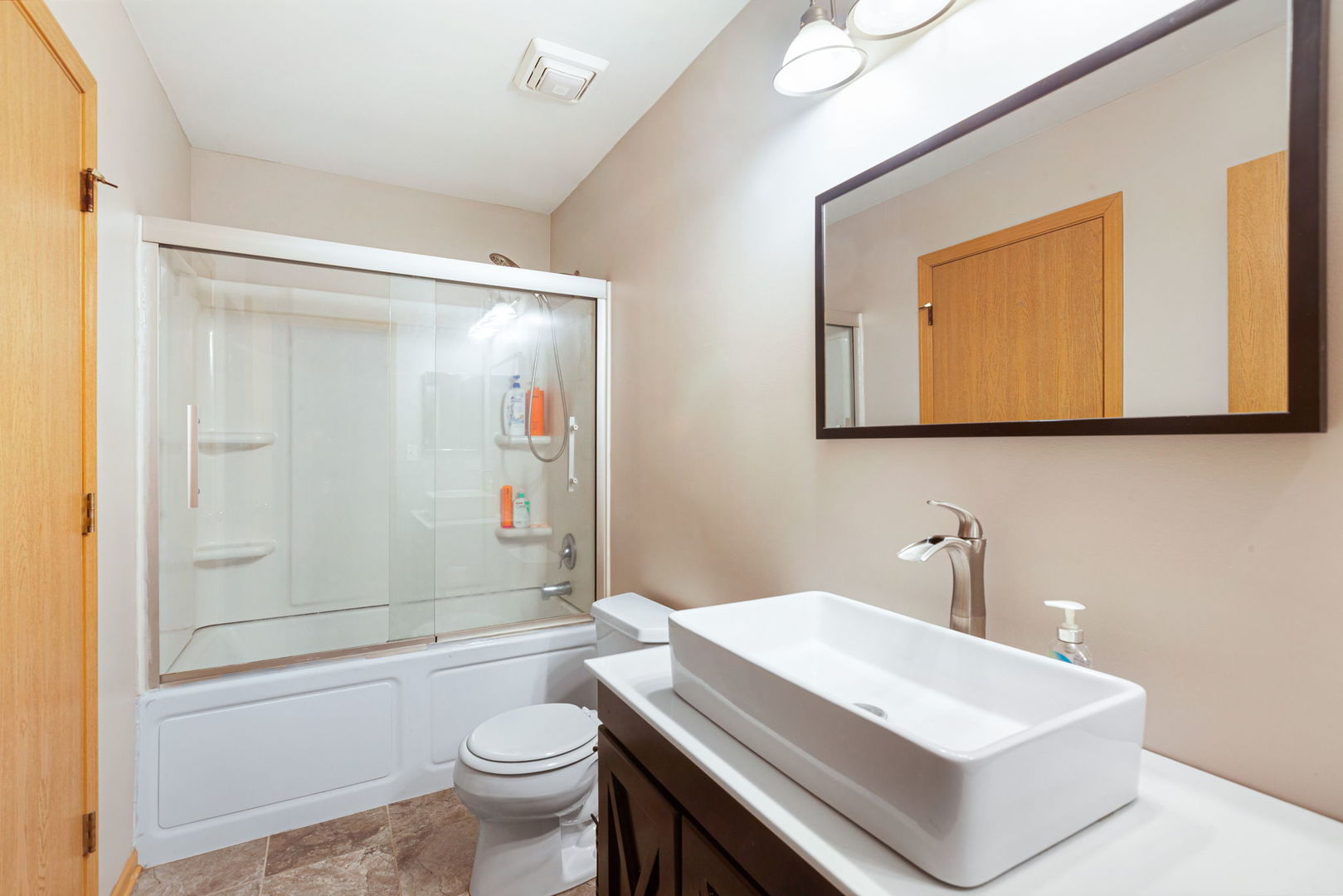 932 Clover Lane Pingree Grove, IL 60140 - Photo 16 of 19 a bathroom with a sink a toilet and shower