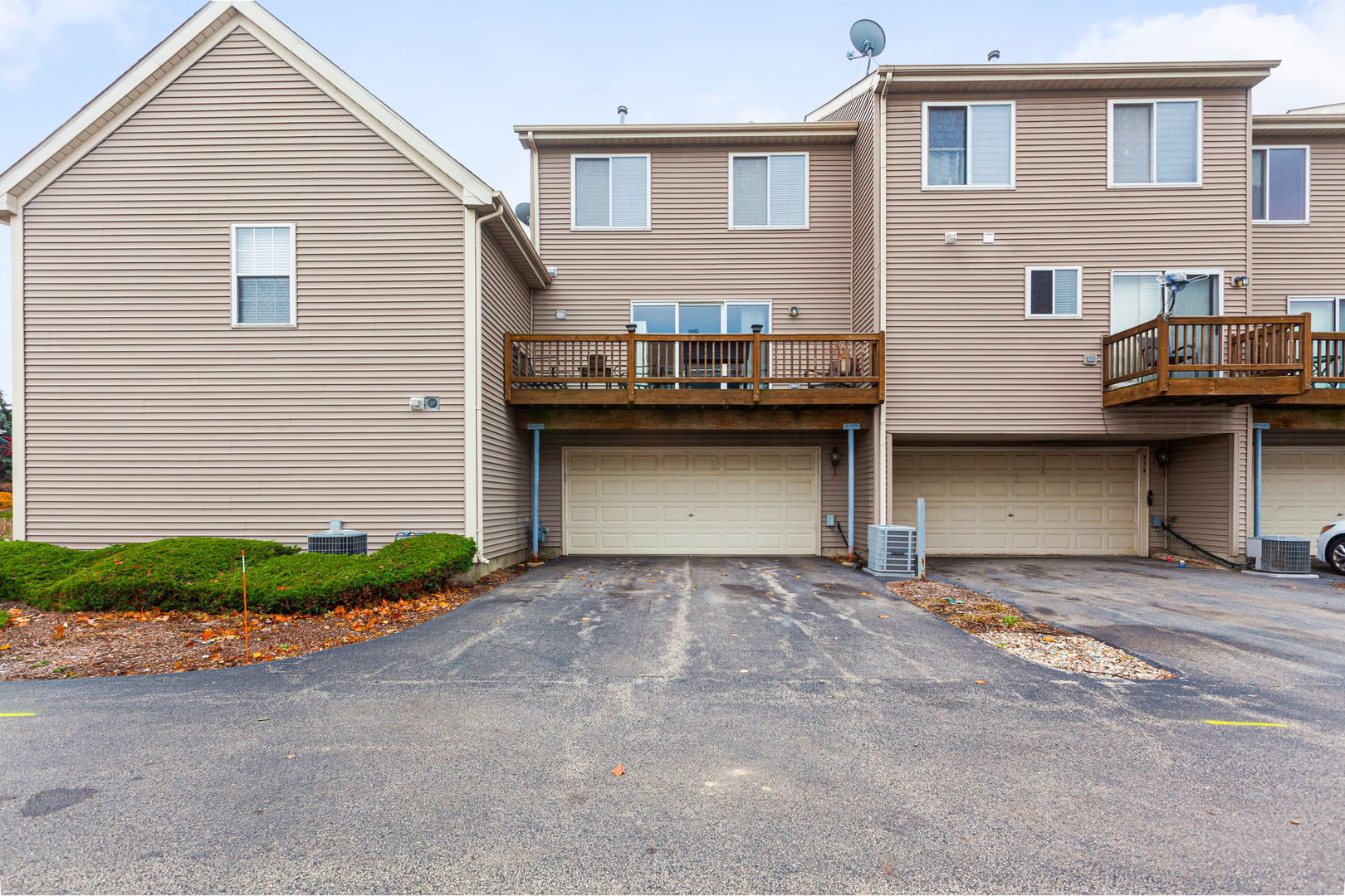 932 Clover Lane Pingree Grove, IL 60140 - Photo 19 of 19 a view of a house with a yard and garage