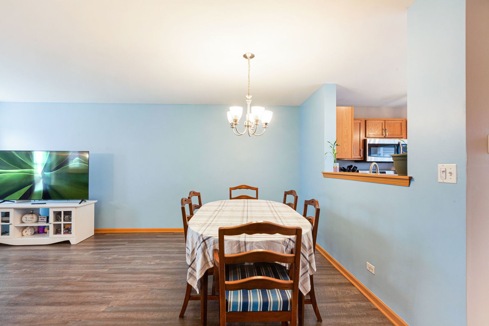 932 Clover Lane Pingree Grove, IL 60140 - Photo 3 of 19 a view of a dining room with furniture and wooden floor