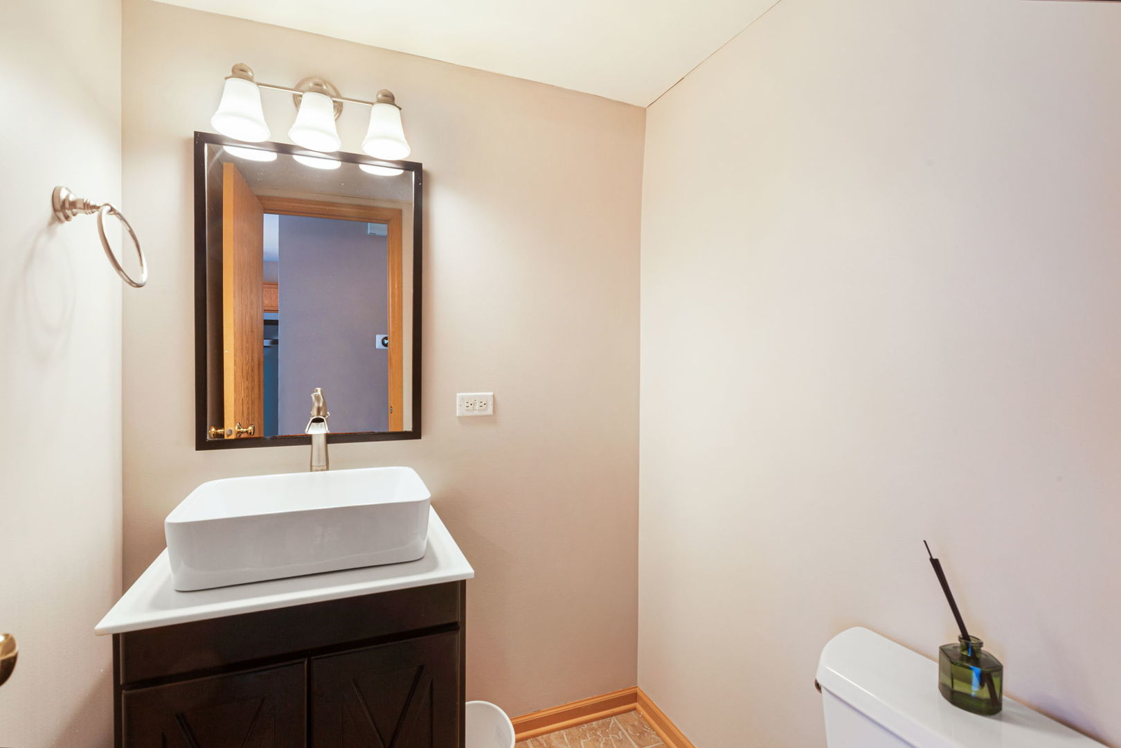 932 Clover Lane Pingree Grove, IL 60140 - Photo 9 of 19 a bathroom with a sink a mirror and vanity