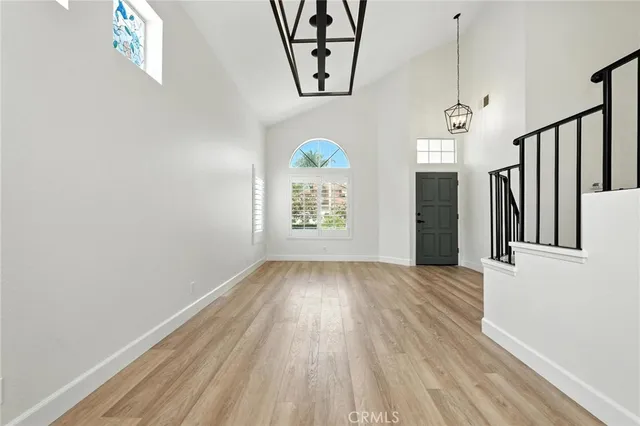 a view of entryway with wooden floor
