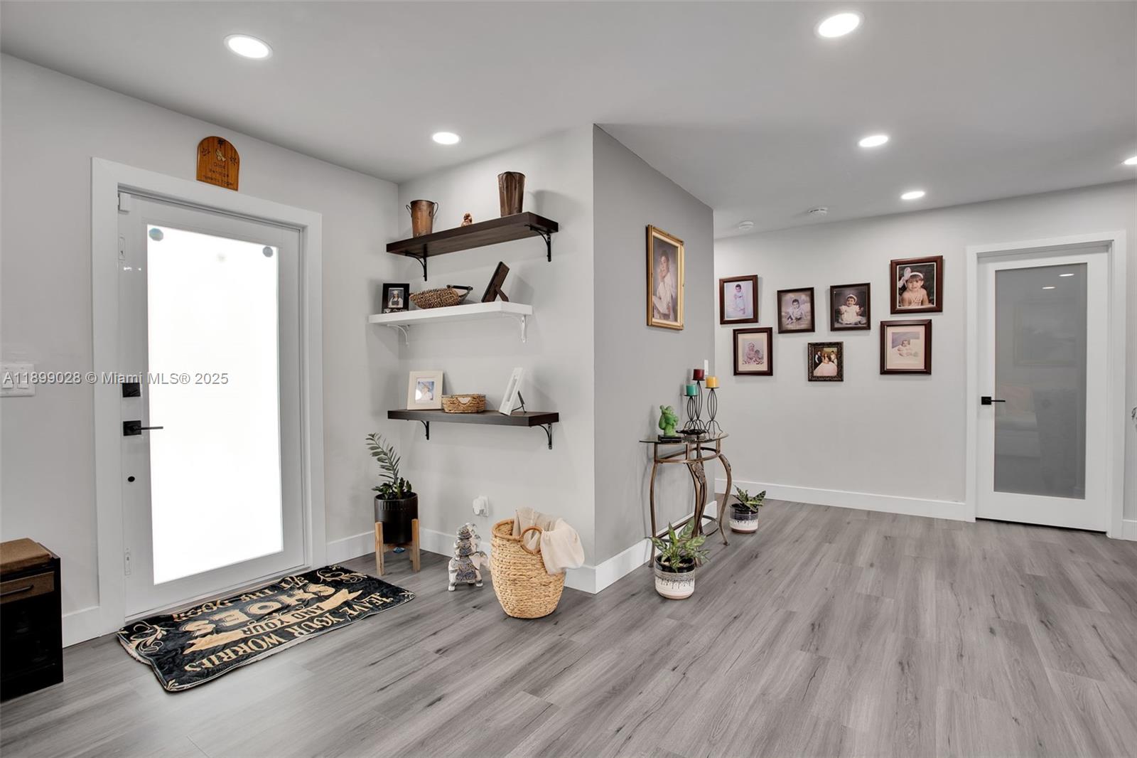 16922 Southwest 107th Place Miami, FL 33157 - Photo 18 of 45 a living room with furniture and wooden floor