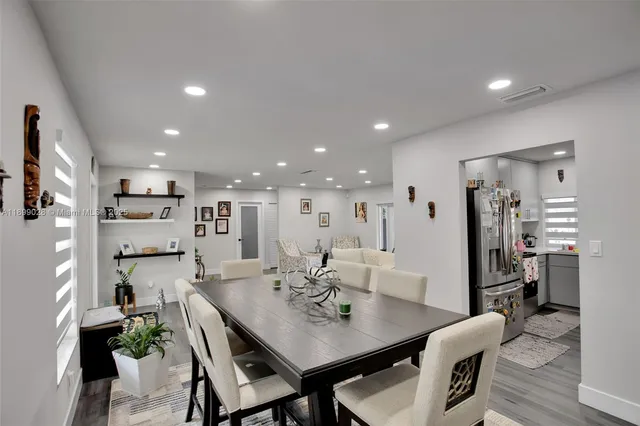 a view of a dining room with furniture