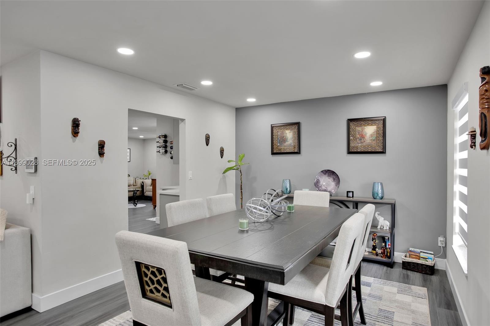 16922 Southwest 107th Place Miami, FL 33157 - Photo 23 of 45 a view of a dining room with furniture