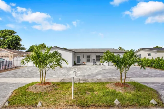 a view of a house with entertaining space