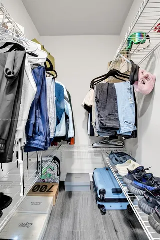 a kitchen with a sink stove and microwave