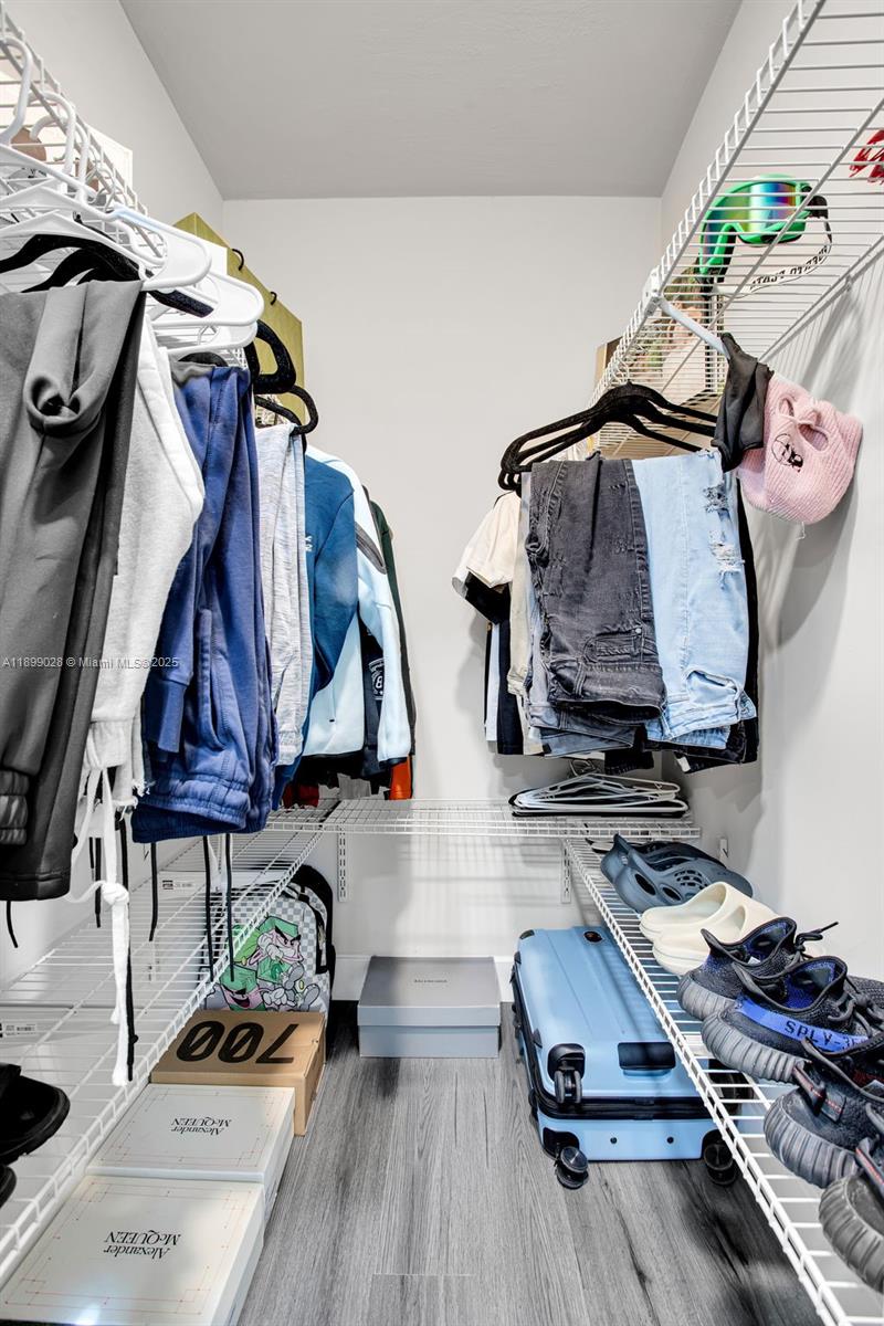 16922 Southwest 107th Place Miami, FL 33157 - Photo 36 of 45 a living room with furniture and wooden floor