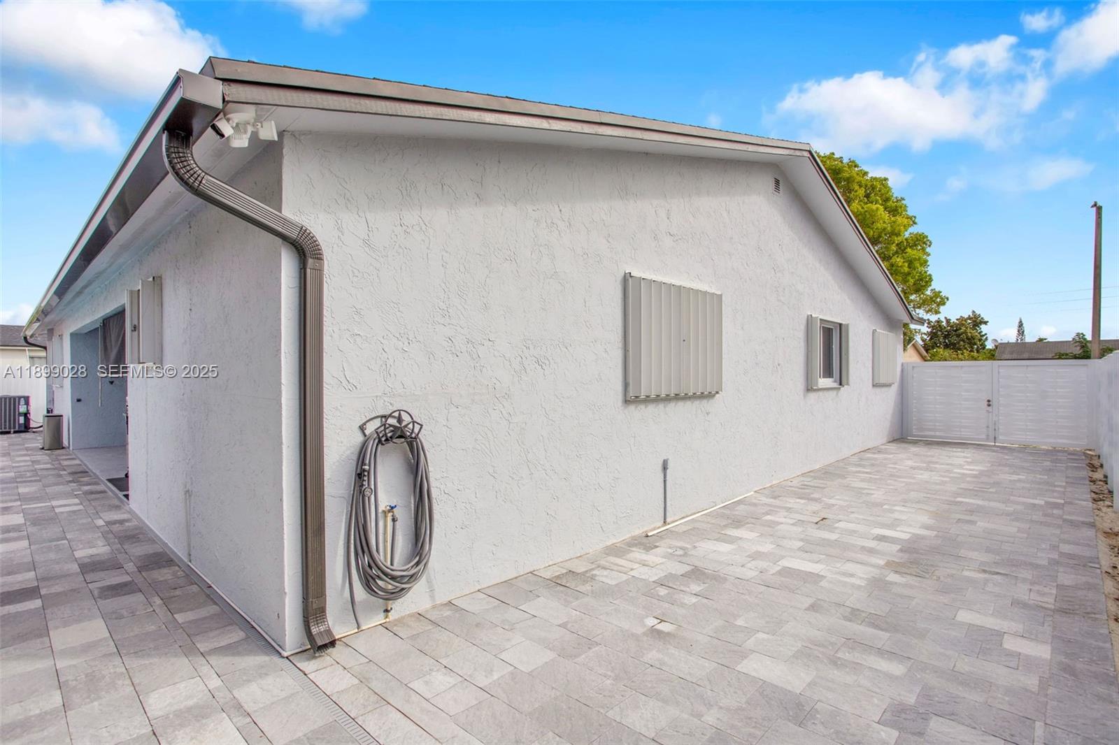 16922 Southwest 107th Place Miami, FL 33157 - Photo 6 of 45 a backyard of a house