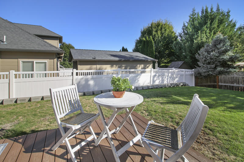 893 Ridgeview Drive Eagle Point, OR 97524 - Photo 44 of 49 a view of a chair and table in backyard of the house