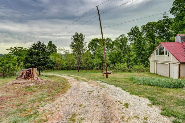 front view of a house with a small yard