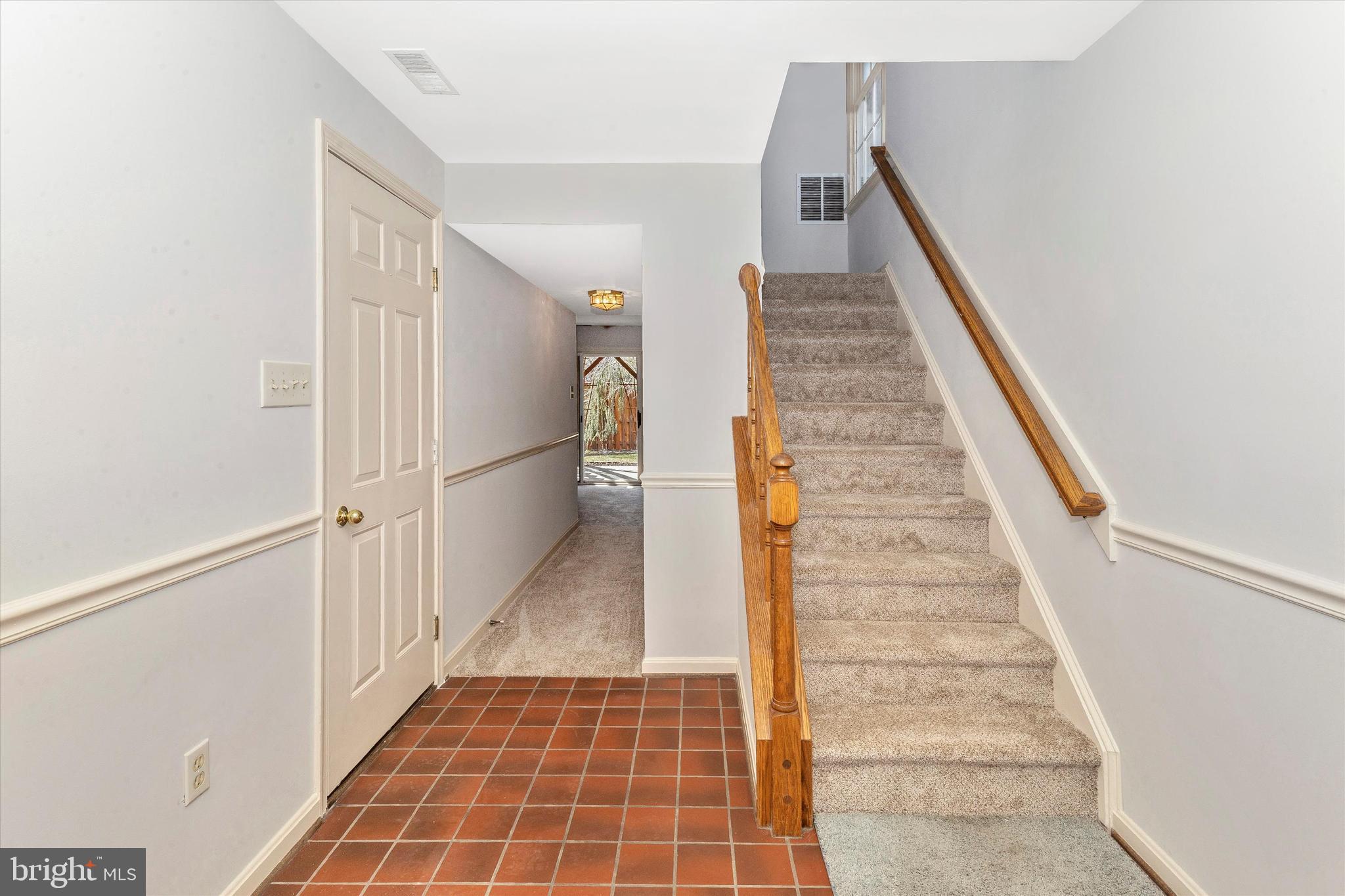 8001 Broken Reed Court Frederick, MD 21701 - Photo 4 of 59 Entryway. Door to left is Garage. Hallway to FR