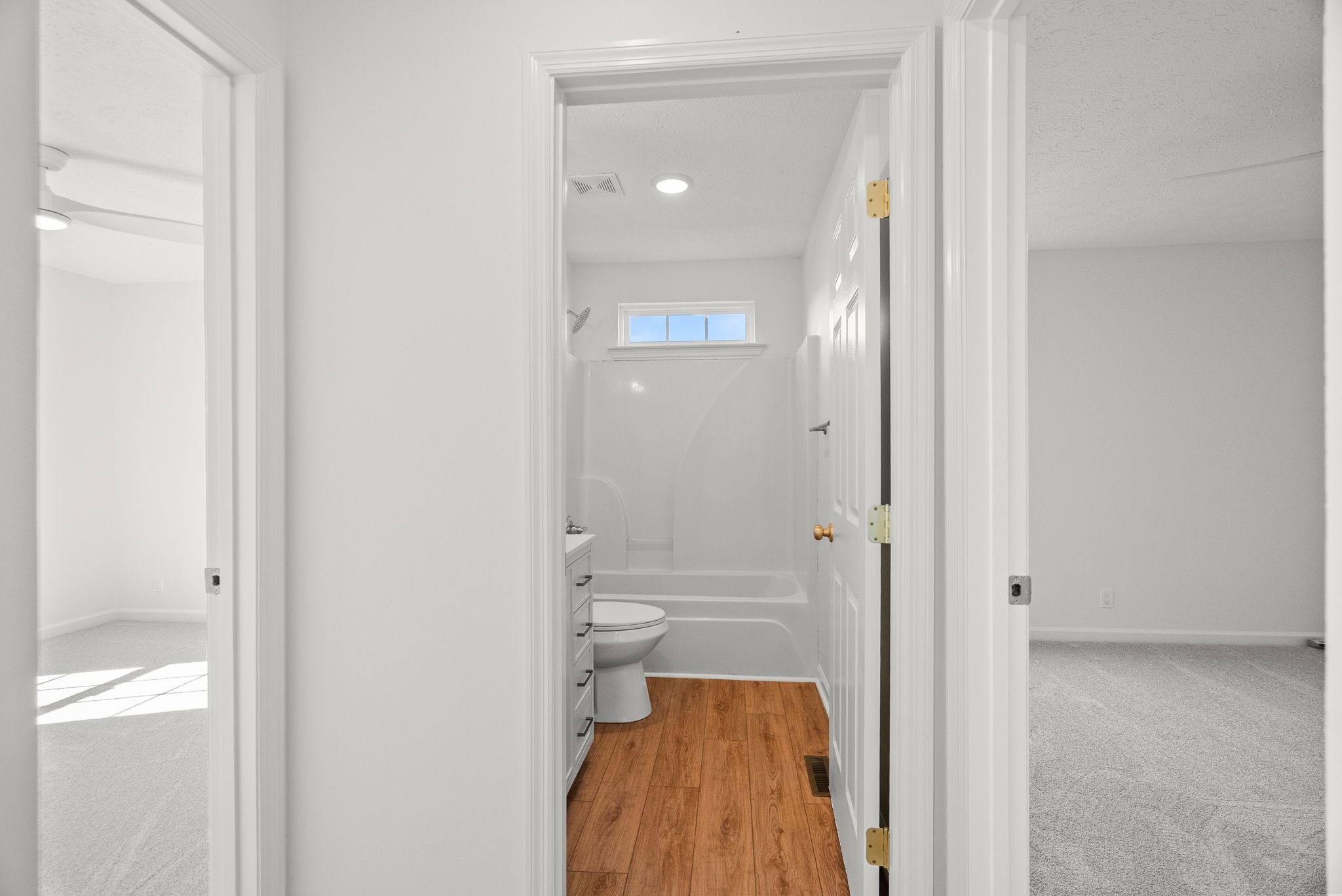 116 Chad Street East Portland, TN 37148 - Photo 20 of 34 a bathroom with a glass shower door