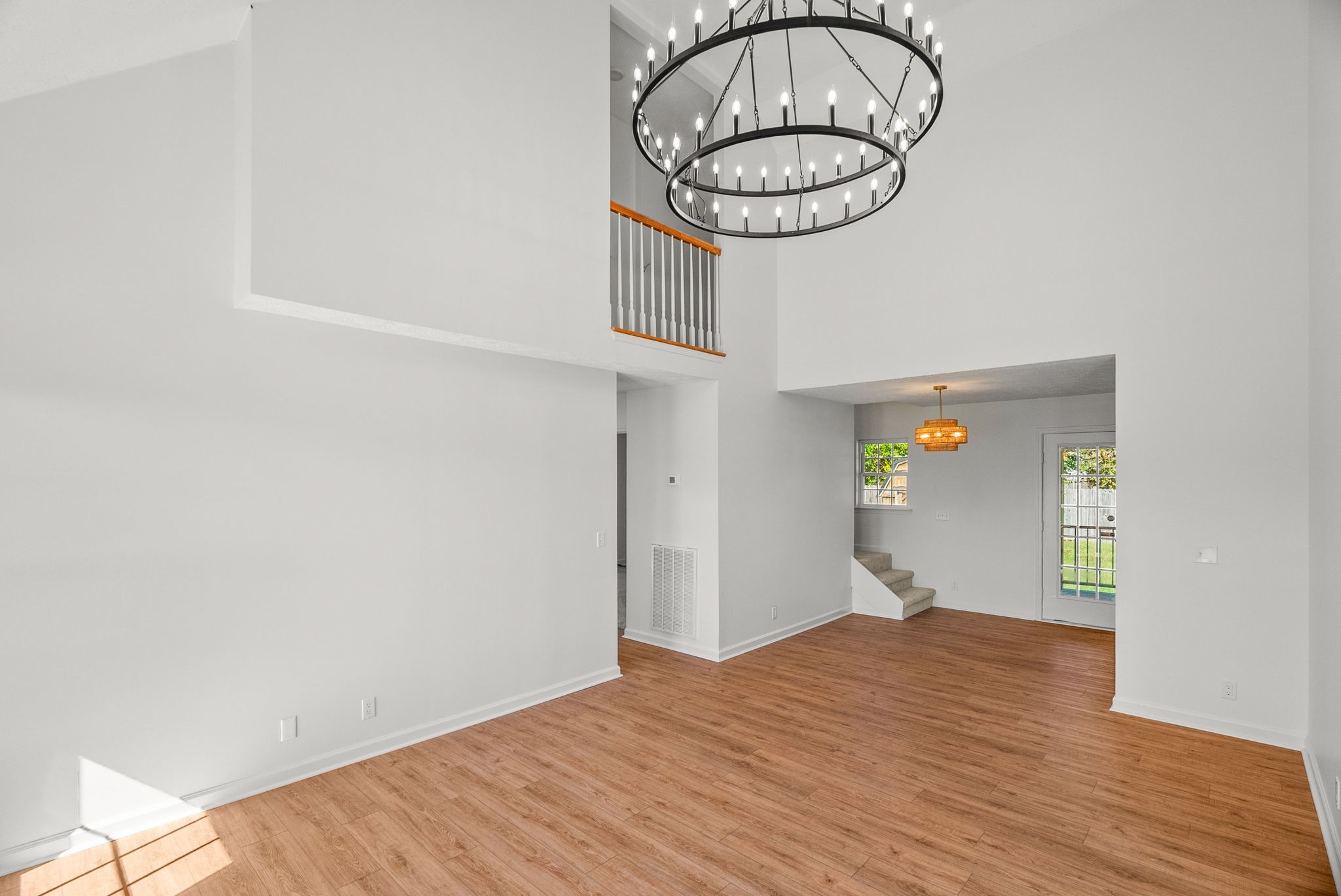116 Chad Street East Portland, TN 37148 - Photo 3 of 34 a view of a hallway with wooden floor and workspace