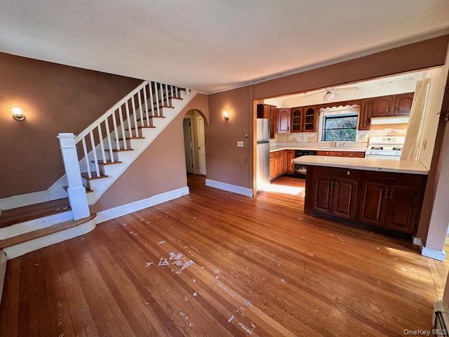 55 Woodhull Landing Road Sound Beach, NY 11789 - Photo 11 of 38 a view of entryway and hall with wooden floor