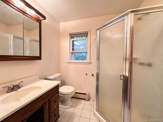 55 Woodhull Landing Road Sound Beach, NY 11789 - Photo 15 of 38 a bathroom with a sink a toilet and shower