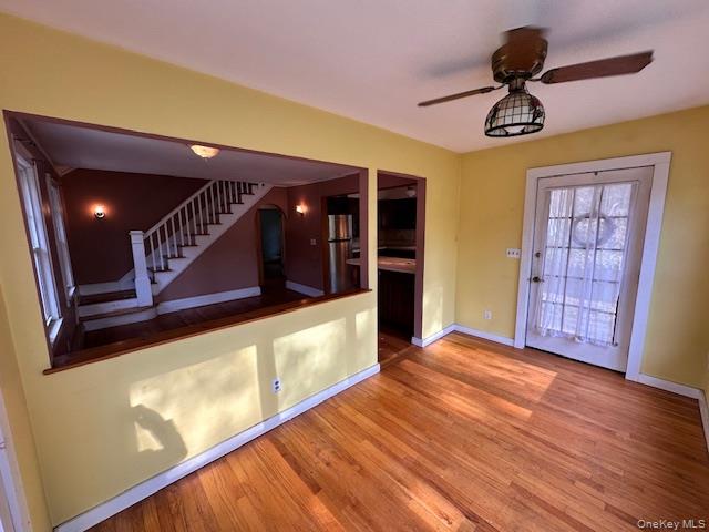 55 Woodhull Landing Road Sound Beach, NY 11789 - Photo 18 of 38 a view of an entryway with wooden floor