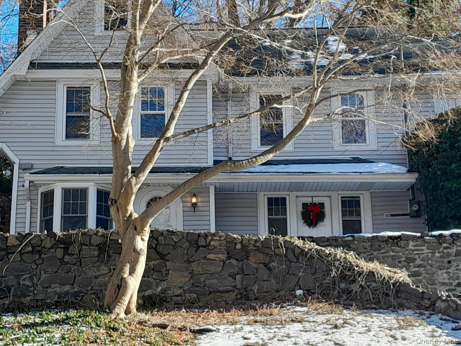 55 Woodhull Landing Road Sound Beach, NY 11789 - Photo 2 of 38 View of front of property with a chimney and a porch