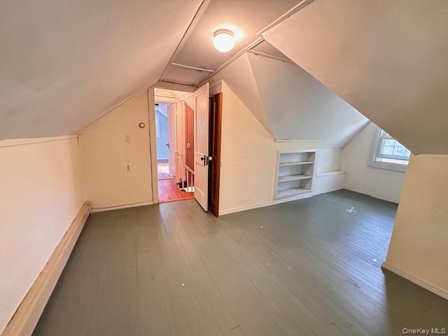 55 Woodhull Landing Road Sound Beach, NY 11789 - Photo 22 of 38 a view of a livingroom with wooden floor