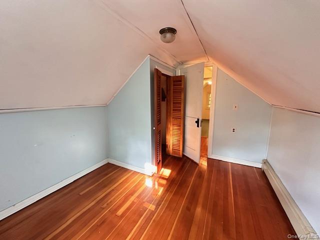 55 Woodhull Landing Road Sound Beach, NY 11789 - Photo 26 of 38 a view of a room with wooden floor and white walls