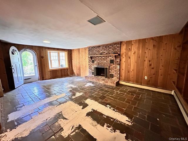 55 Woodhull Landing Road Sound Beach, NY 11789 - Photo 27 of 38 a view of an empty room with window and fireplace