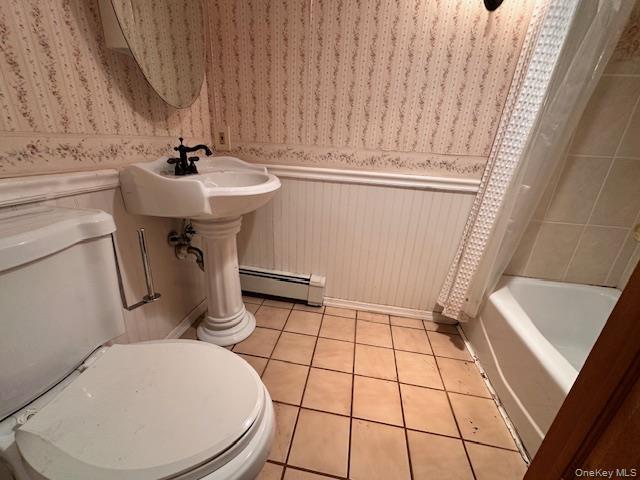 55 Woodhull Landing Road Sound Beach, NY 11789 - Photo 28 of 38 a bathroom with a sink toilet and shower