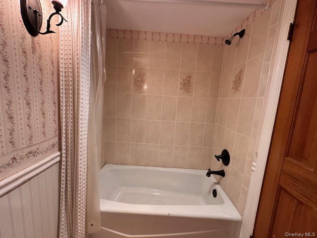 55 Woodhull Landing Road Sound Beach, NY 11789 - Photo 29 of 38 a bathroom with a bathtub