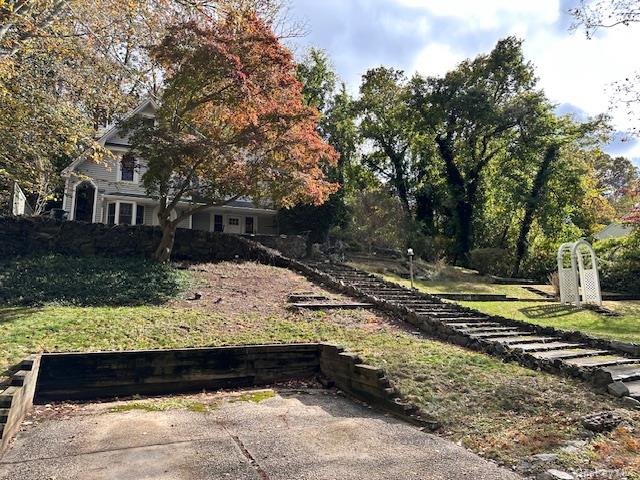 55 Woodhull Landing Road Sound Beach, NY 11789 - Photo 5 of 38 a view of a yard with wooden fence
