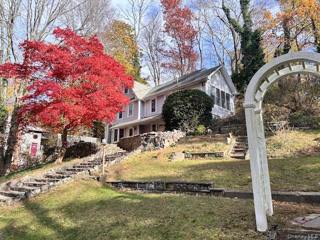 55 Woodhull Landing Road Sound Beach, NY 11789 - Photo 10 of 38 a view of a house with snow on the tree