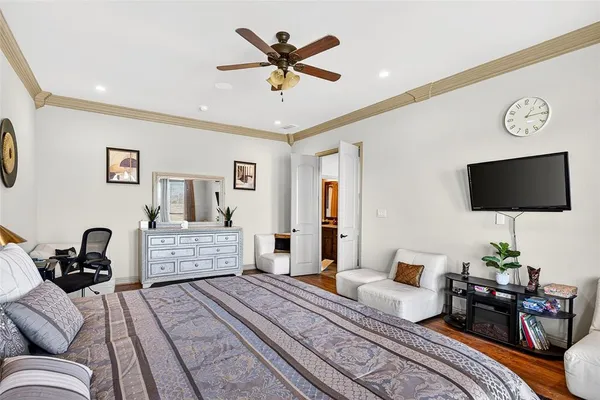 a bedroom with bed and a window